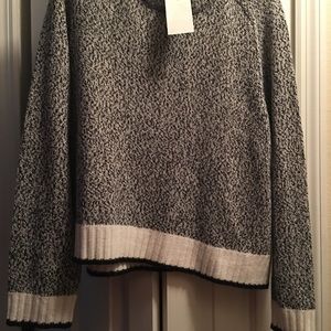 Cropped black and white sweater